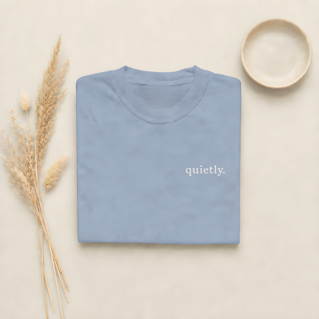 Blue Jean garment-dyed Comfort Colors tee with "quietly" embroidered on the chest, Soft Rebellion