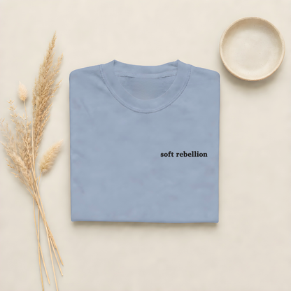 Blue Jean garment-dyed Comfort Colors tee with Soft Rebellion embroidered on the chest