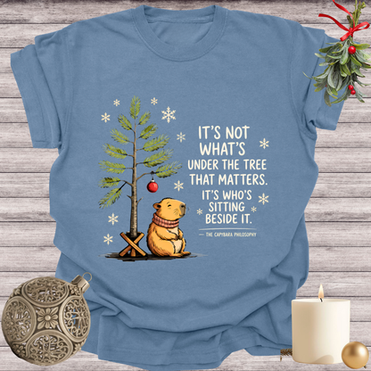 Blue Jean garment-dyed Comfort Colors tee reading "it's not what's under the tree that matters, it's who's sitting beside it", Soft Rebellion