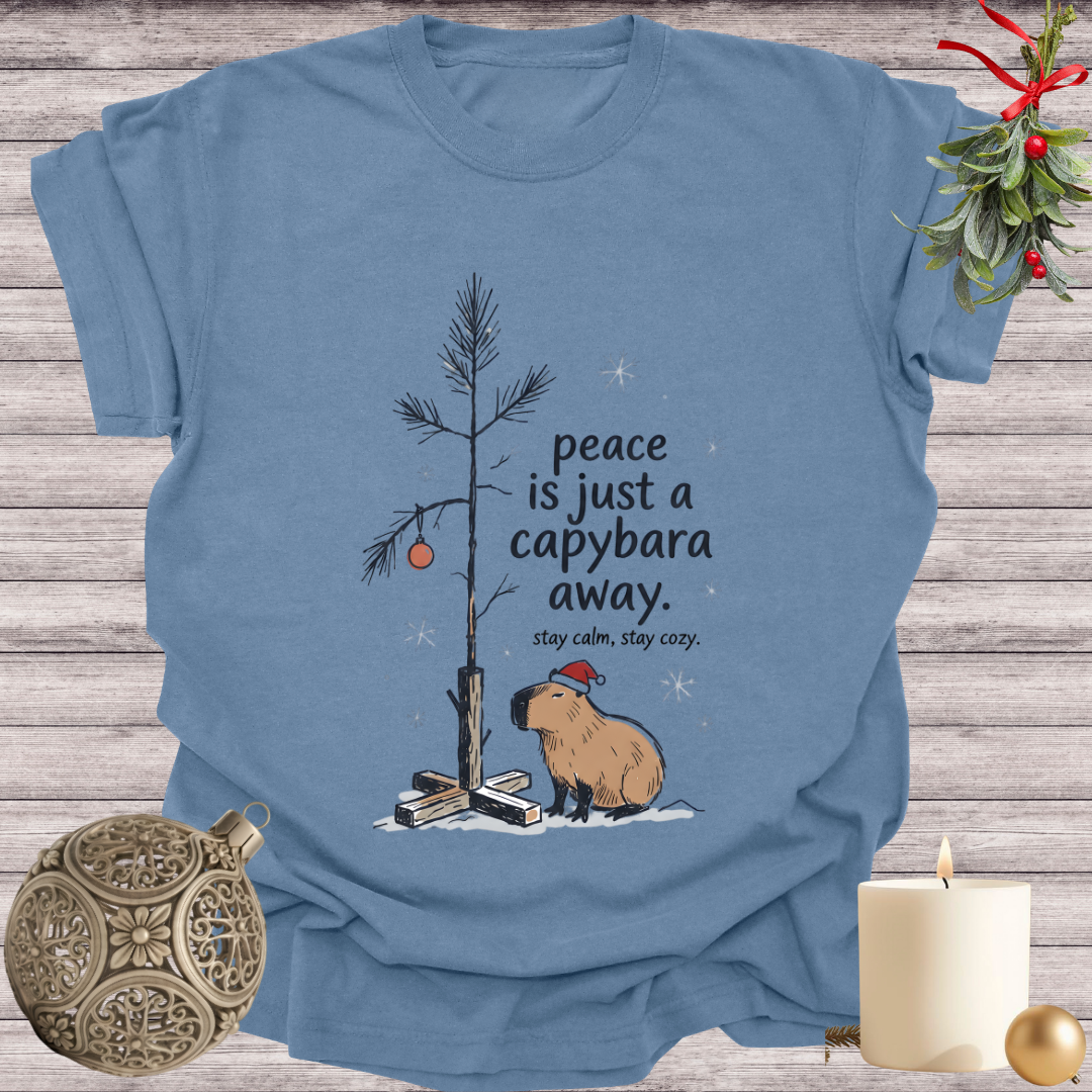 Blue Jean garment-dyed Comfort Colors tee reading "peace is just a capybara away", Soft Rebellion