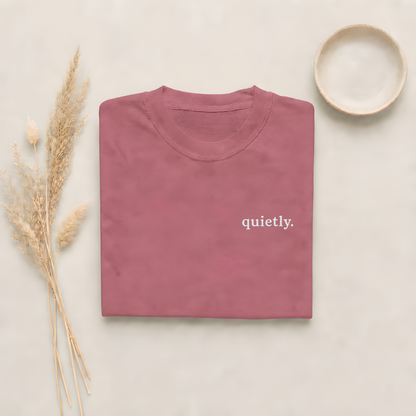 Brick garment-dyed Comfort Colors tee with "quietly" embroidered on the chest, Soft Rebellion