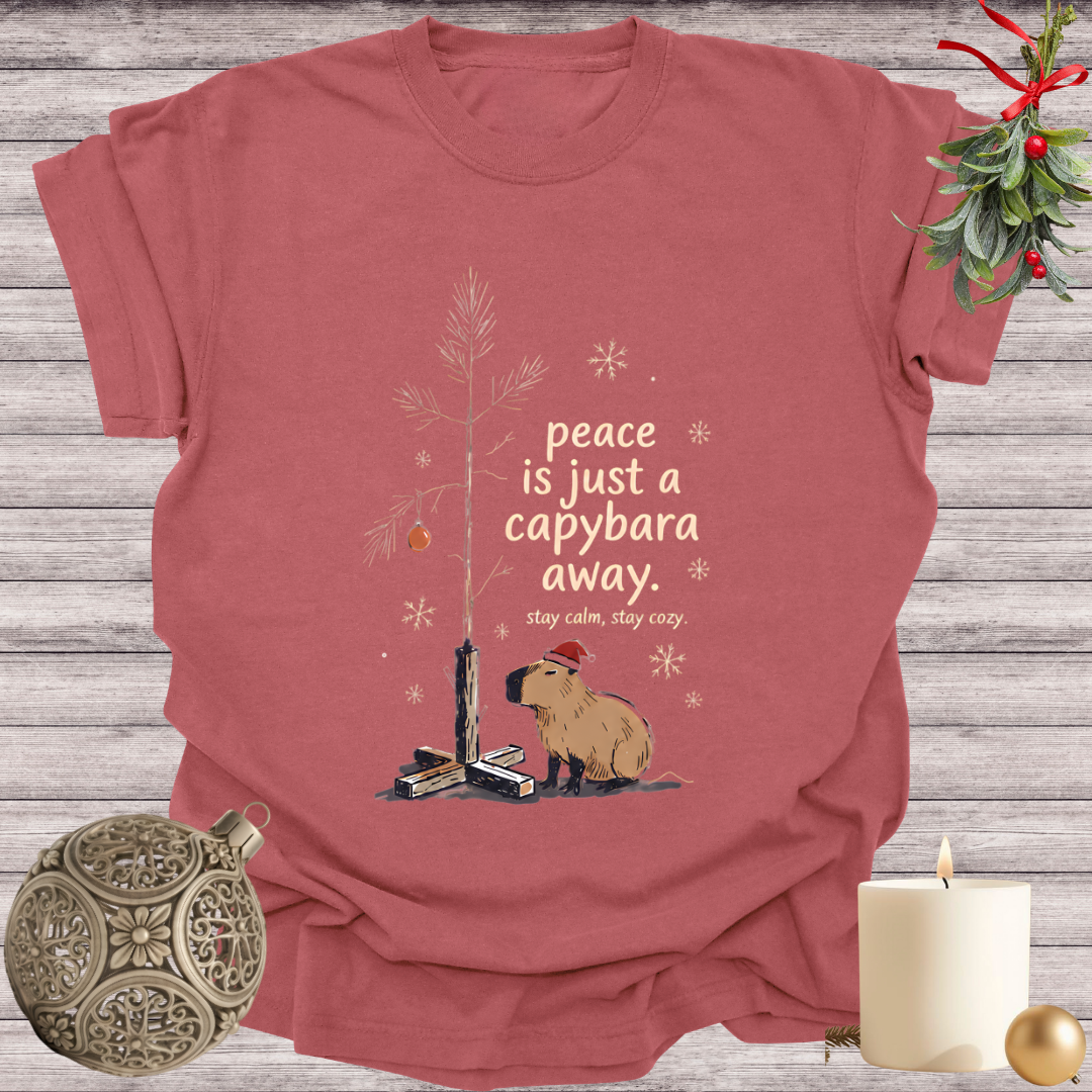 Brick garment-dyed Comfort Colors tee reading "peace is just a capybara away", Soft Rebellion