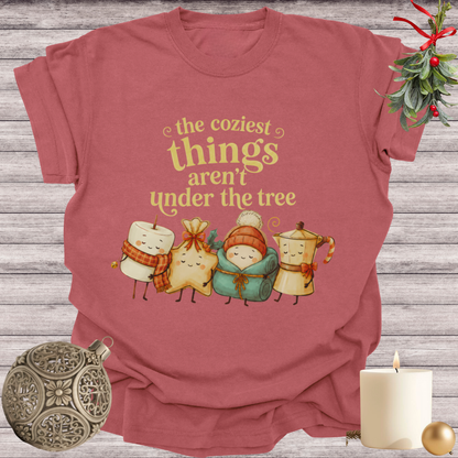 Brick garment-dyed Comfort Colors tee reading "the coziest things aren't under the tree", Soft Rebellion