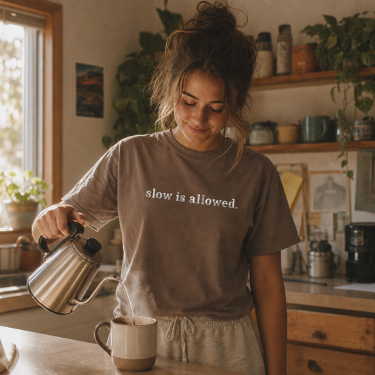 Espresso garment-dyed Comfort Colors tee with "slow is allowed" embroidered on the chest, Soft Rebellion