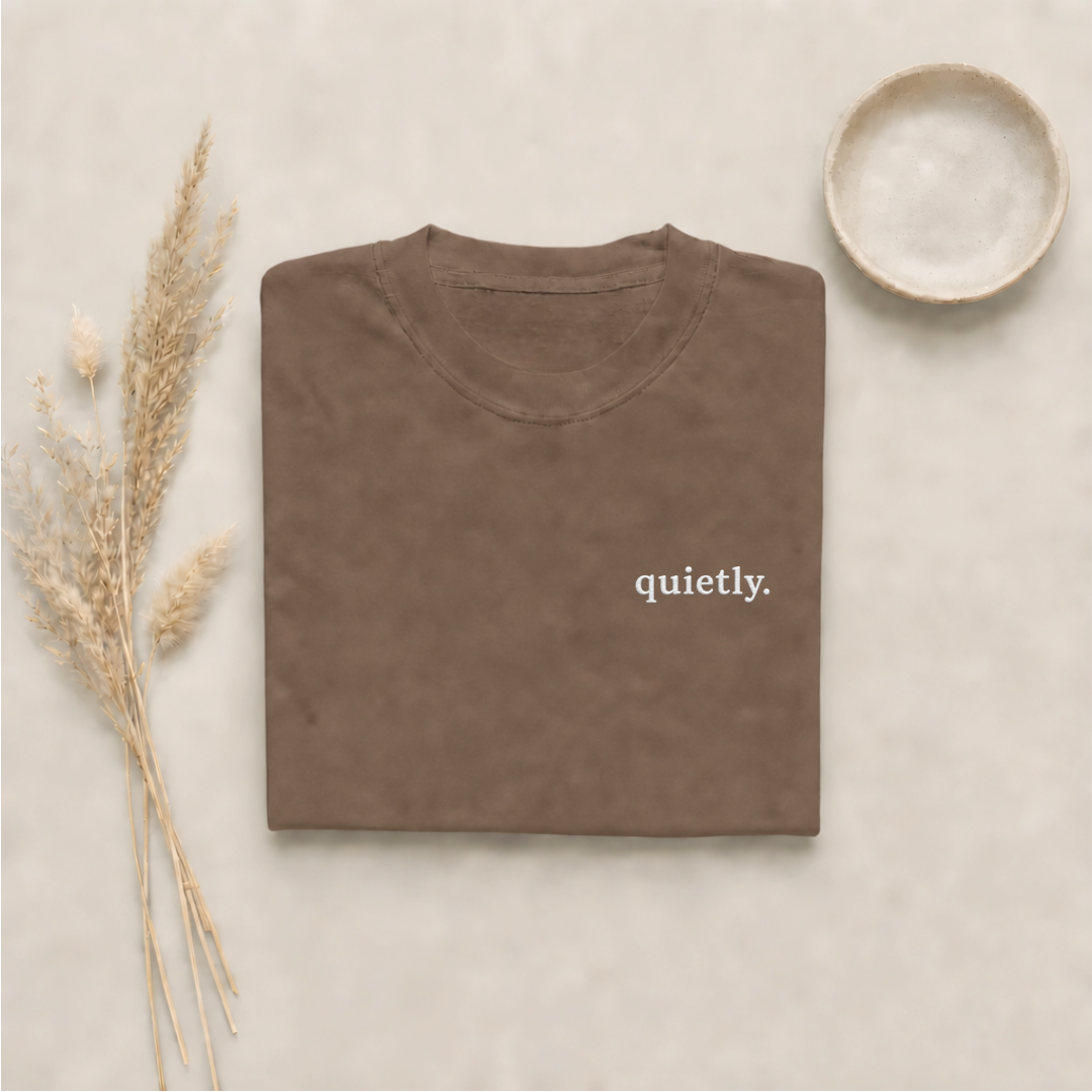 Espresso garment-dyed Comfort Colors tee with "quietly" embroidered on the chest, Soft Rebellion