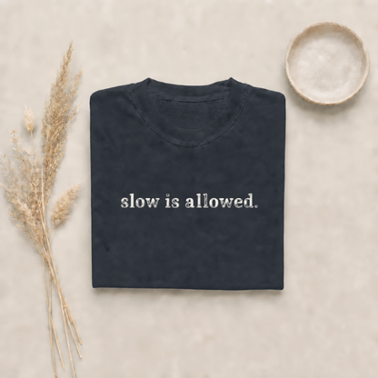 Graphite garment-dyed Comfort Colors tee with "slow is allowed" embroidered on the chest, Soft Rebellion