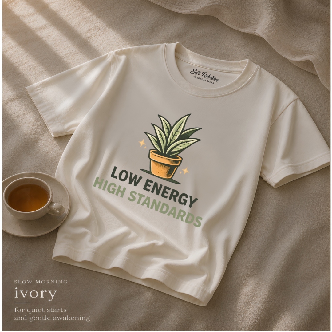 Ivory garment-dyed Comfort Colors tee reading "Low Energy High Standards", Soft Rebellion