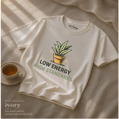 Ivory garment-dyed Comfort Colors tee reading "Low Energy High Standards", Soft Rebellion
