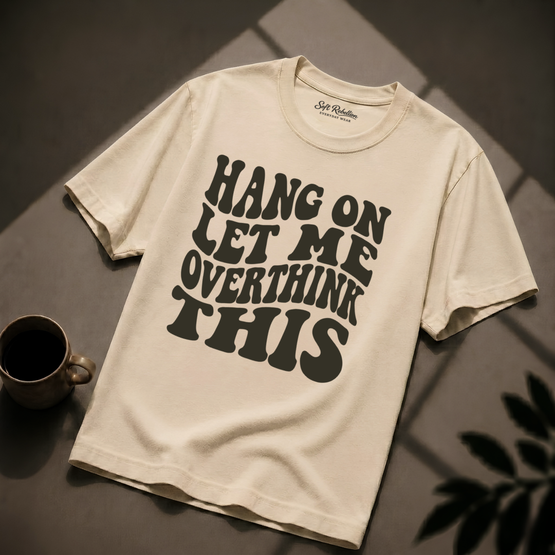 Ivory garment-dyed Comfort Colors tee reading "Hang On Let Me Overthink This", Soft Rebellion