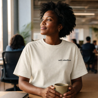 Ivory garment-dyed Comfort Colors tee with Soft Rebellion embroidered on the chest