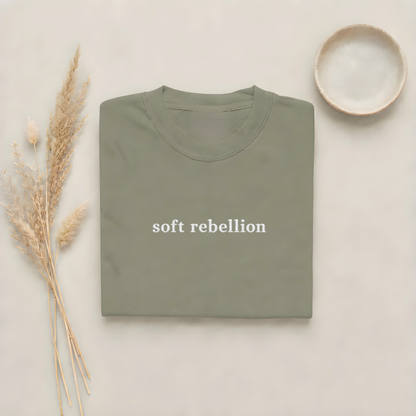 Moss garment-dyed Comfort Colors tee with Soft Rebellion embroidered on the center chest
