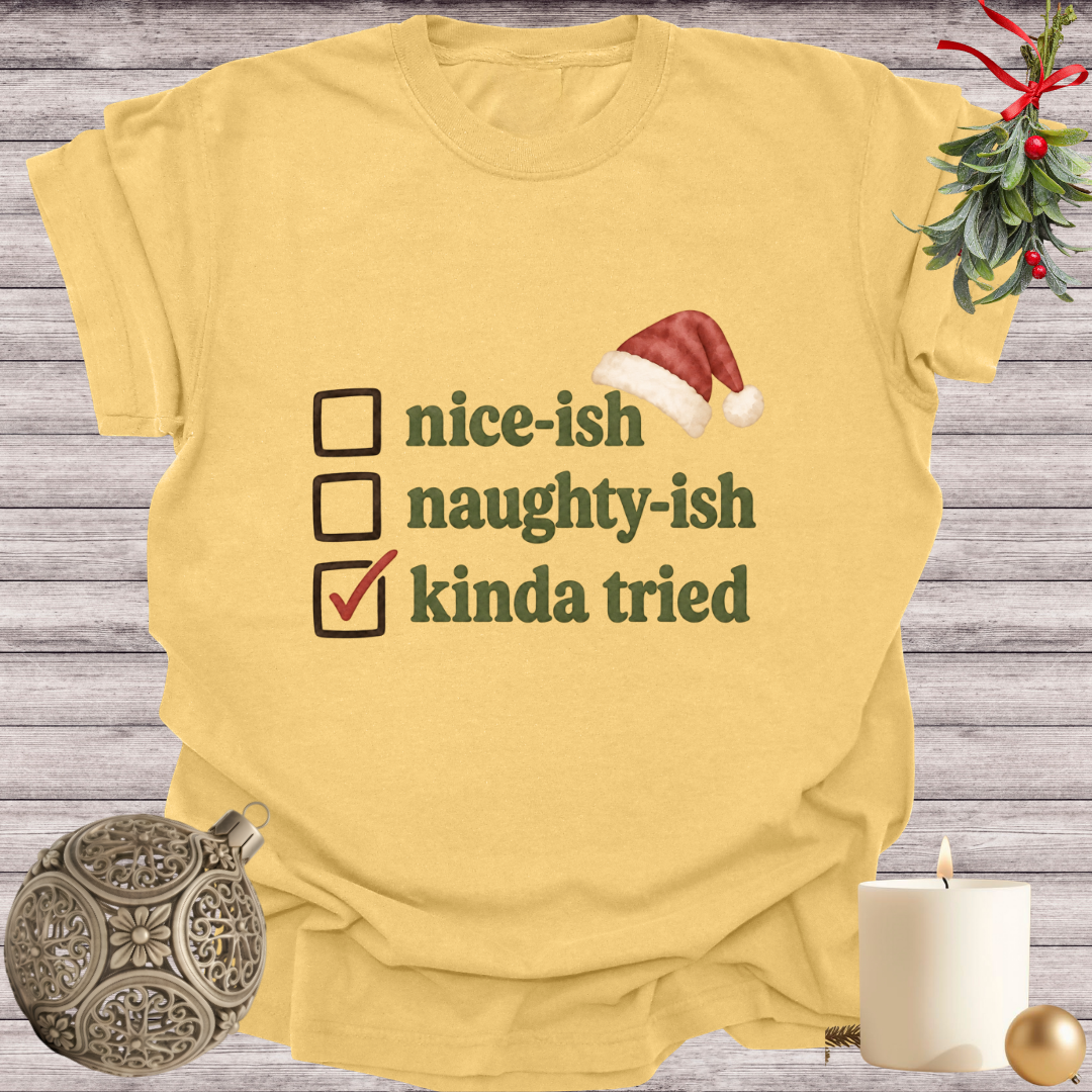 Mustard garment-dyed Comfort Colors tee reading "nice-ish, naughty-ish, kinda tried", Soft Rebellion