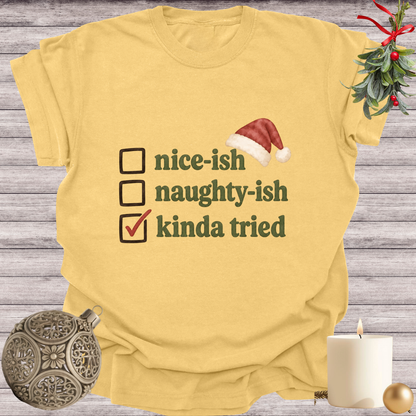 Mustard garment-dyed Comfort Colors tee reading "nice-ish, naughty-ish, kinda tried", Soft Rebellion