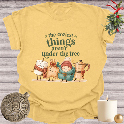 Mustard garment-dyed Comfort Colors tee reading "the coziest things aren't under the tree", Soft Rebellion