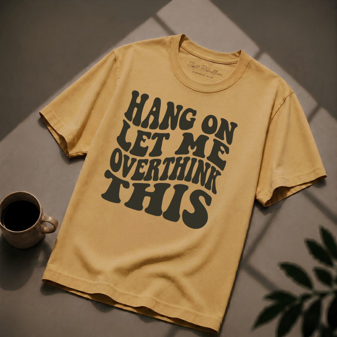 Mustard garment-dyed Comfort Colors tee reading "Hang On Let Me Overthink This", Soft Rebellion