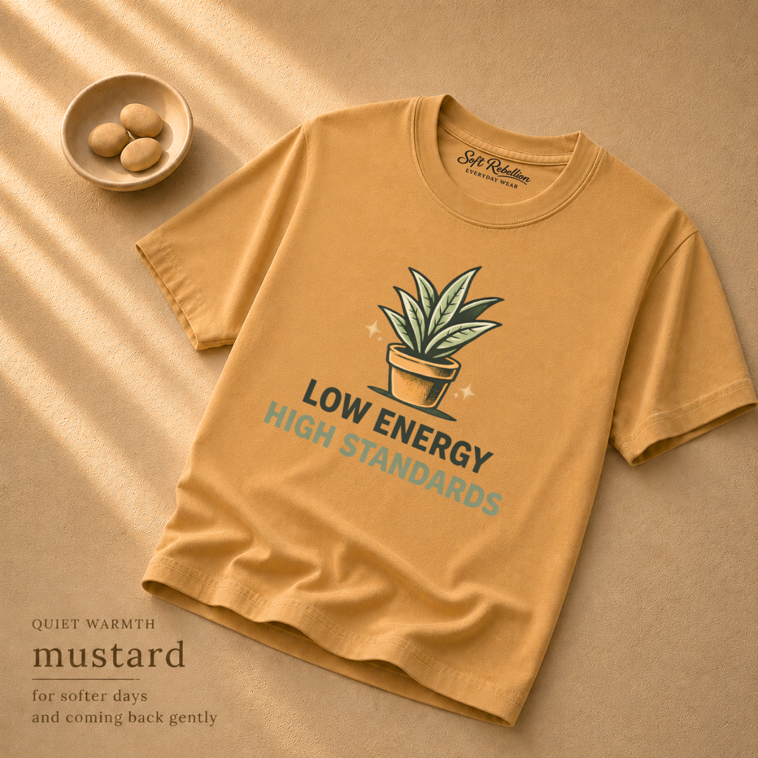 Mustard garment-dyed Comfort Colors tee reading "Low Energy High Standards", Soft Rebellion