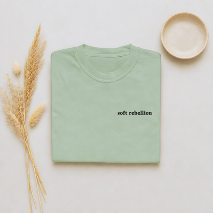 Bay garment-dyed Comfort Colors tee with Soft Rebellion embroidered on the chest