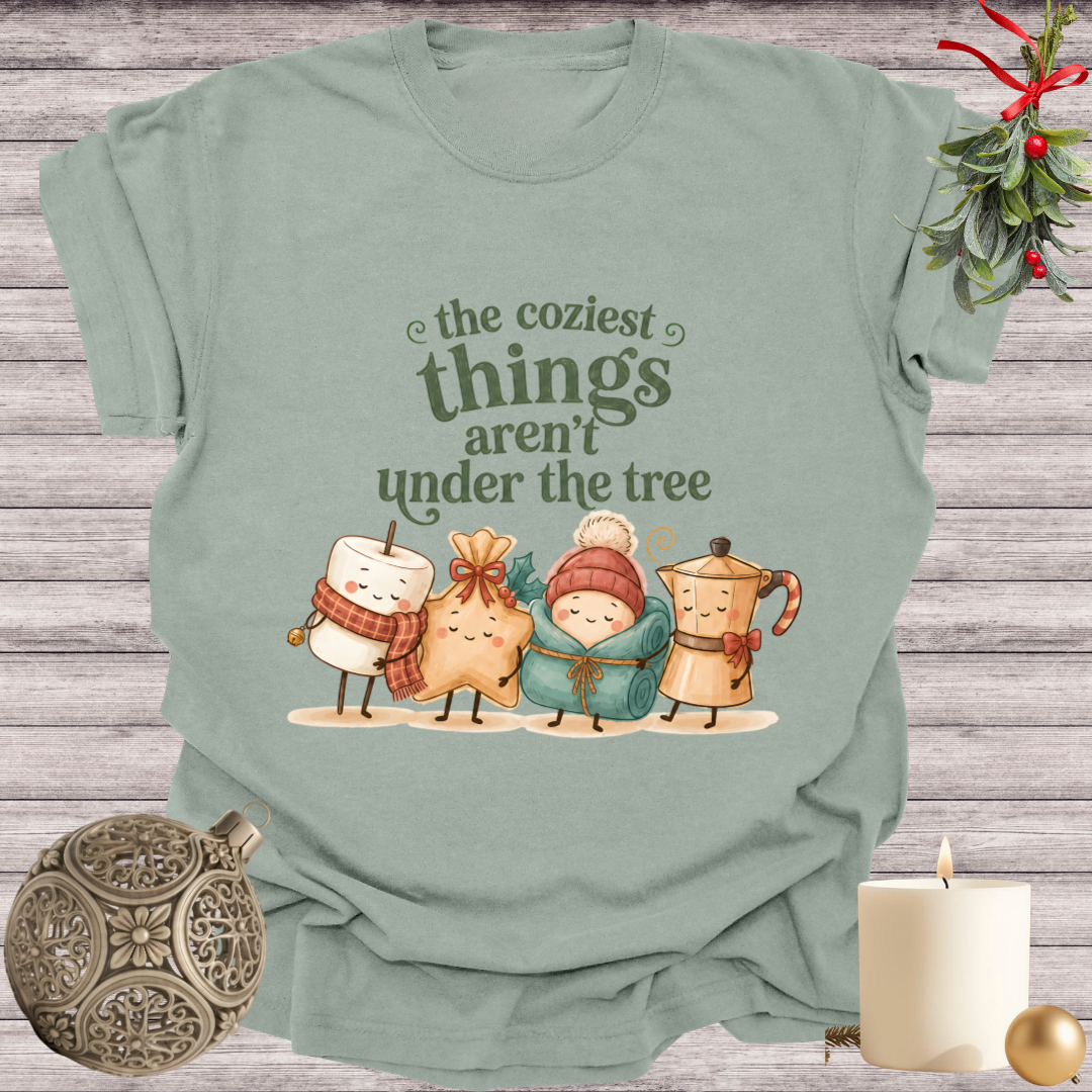 Bay garment-dyed Comfort Colors tee reading "the coziest things aren't under the tree", Soft Rebellion