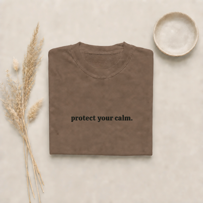 Espresso garment-dyed Comfort Colors tee with "protect your calm" embroidered on the chest, Soft Rebellion