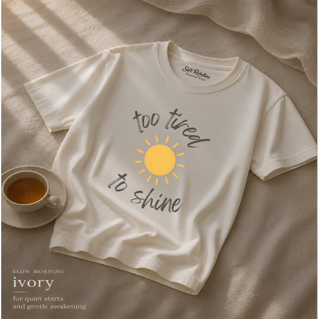 Ivory garment-dyed Comfort Colors tee reading "Too Tired To Shine", Soft Rebellion