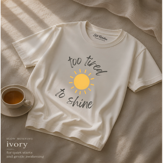 Ivory garment-dyed Comfort Colors tee reading "Too Tired To Shine", Soft Rebellion